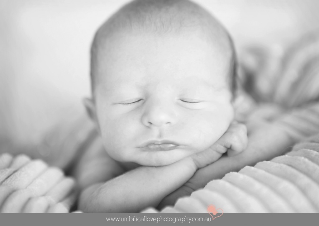 baby asleep on both hands