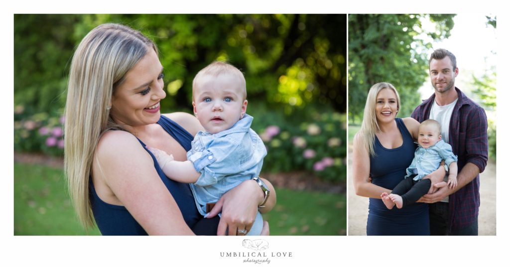 Baby boy with big blue eyes staring at the camera with his mum