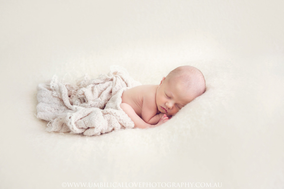 Wagga-Wagga-Newborn-Baby-Photography newborn baby sleeping on her side