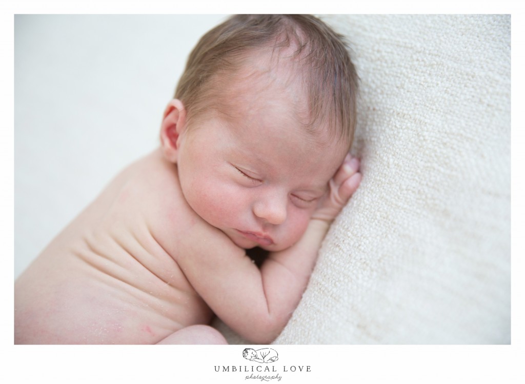 New baby sleeping on its front