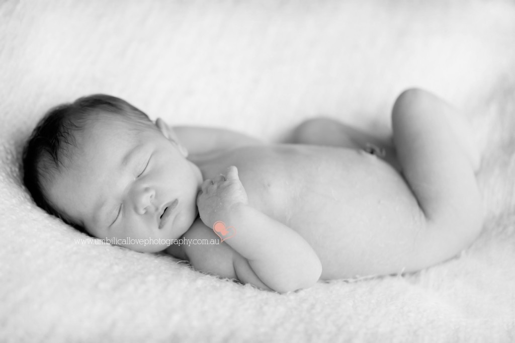baby still has umbilical cord attached 