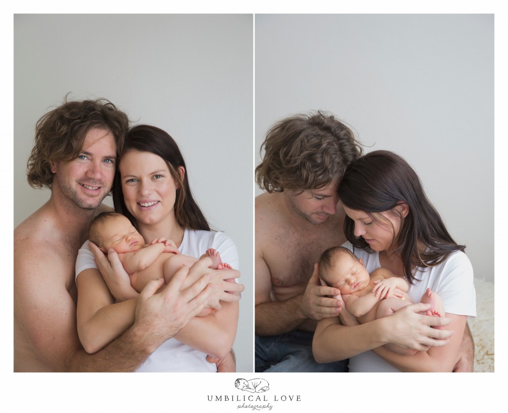 Mum and dad holding baby