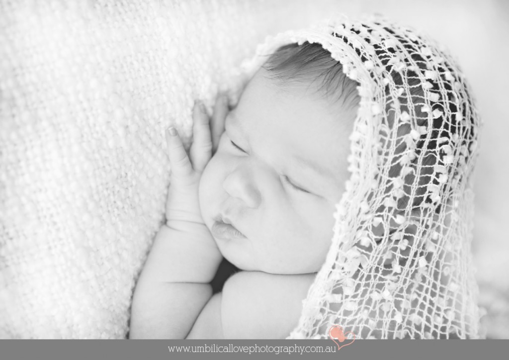 new baby wrapped up sleeping