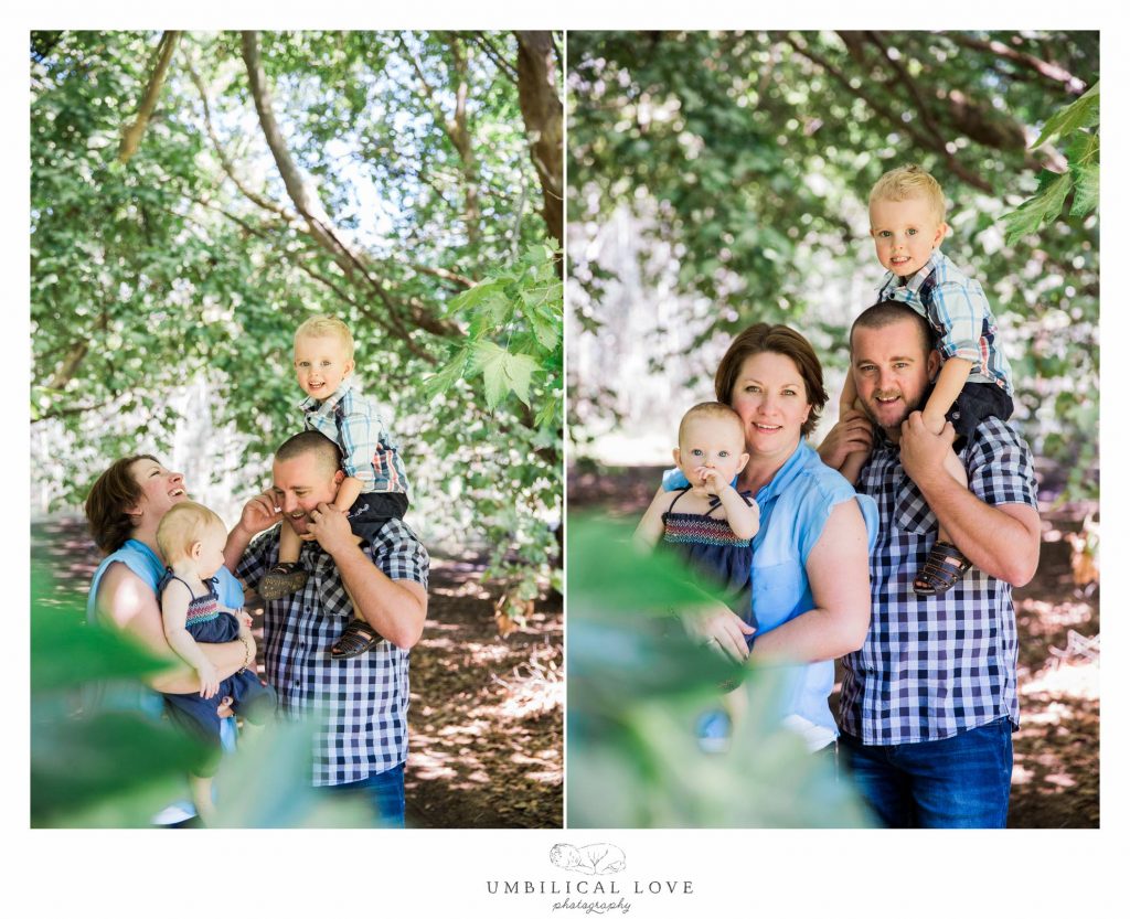 family hugging each other and looking at the camera