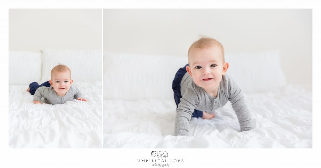 Little boy trying to crawl on donna