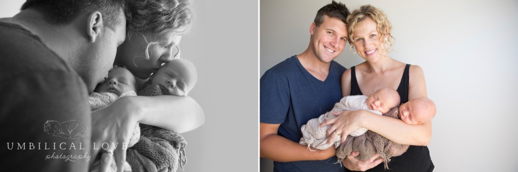 proud parents holding their newborn twin sons