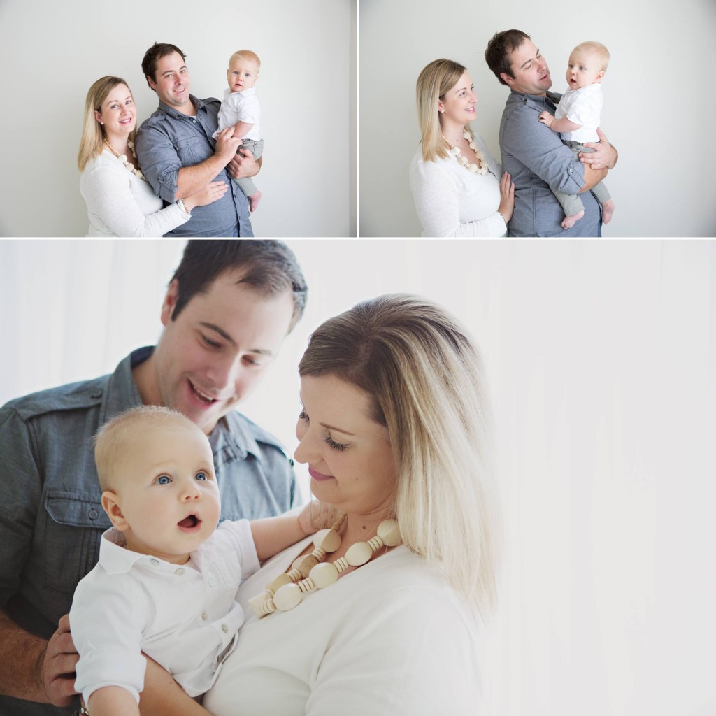Mum and Dad enjoy a moment with their baby boy holding him in their arms