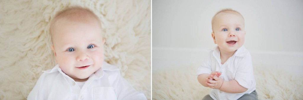Cheeky smiles from the toddler lying on his back and sitting up looking at the camera