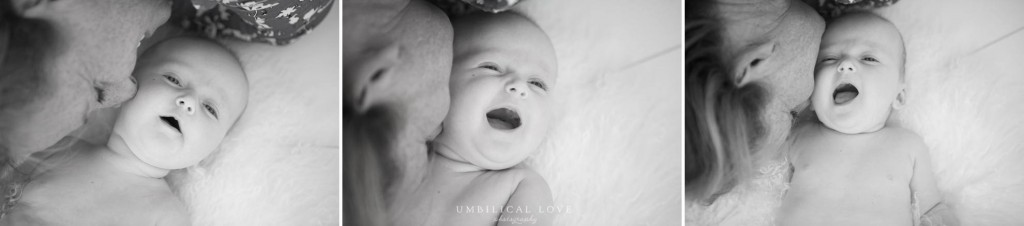Mummy and daughter moment as mum blows kisses on the baby's cheek and she laughs