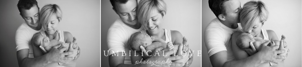 proud parents holding their newborn