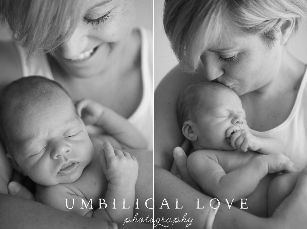 mother kissing her newborn baby son on the forehead