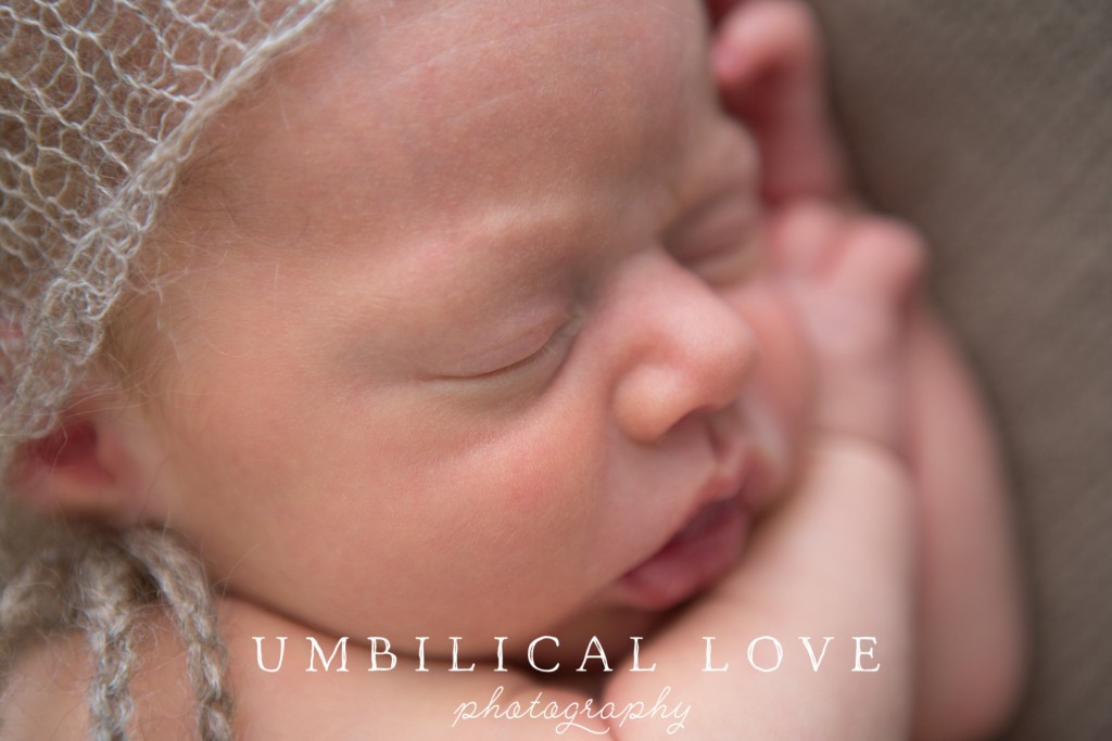 close up of newborns face