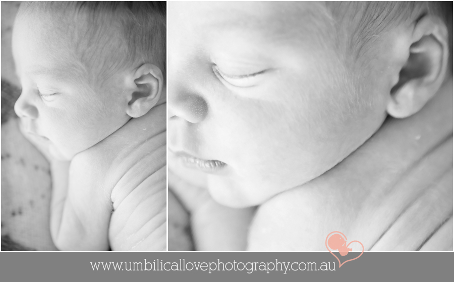 newborn baby laying on side with wrinkles on his back sleeping