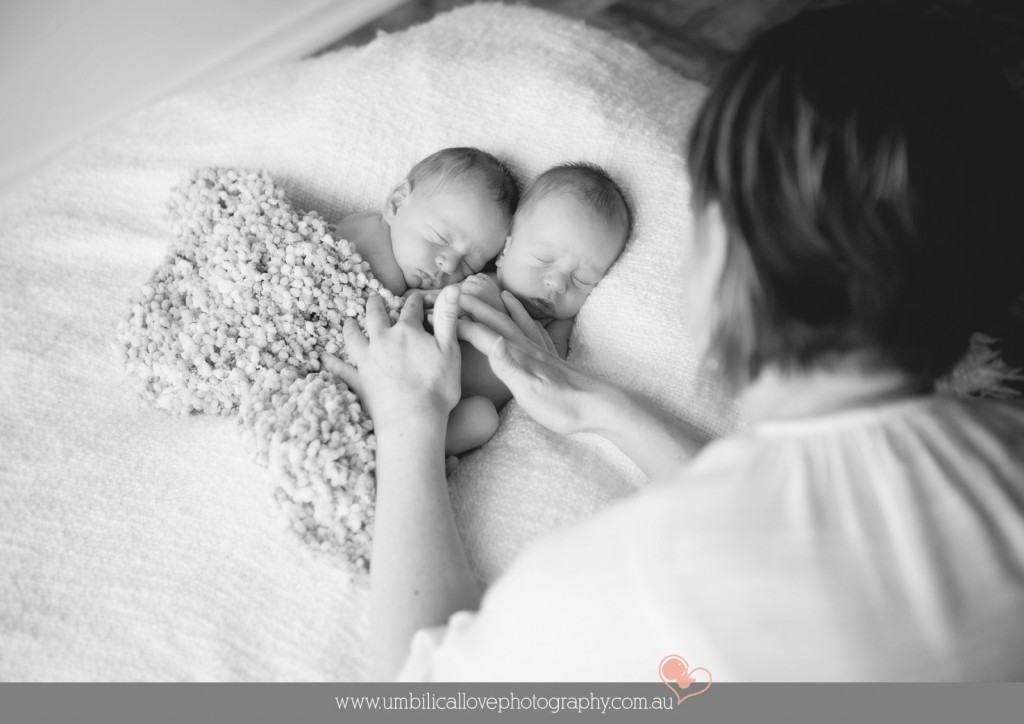 calming & settling newborn twin babies for photography session