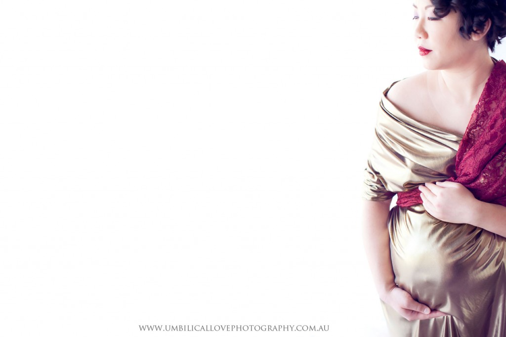 pregnant lady draped with beautiful material