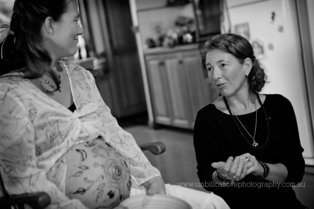 sharing at blessing way photographer sharing bead at blessing way looking at mum