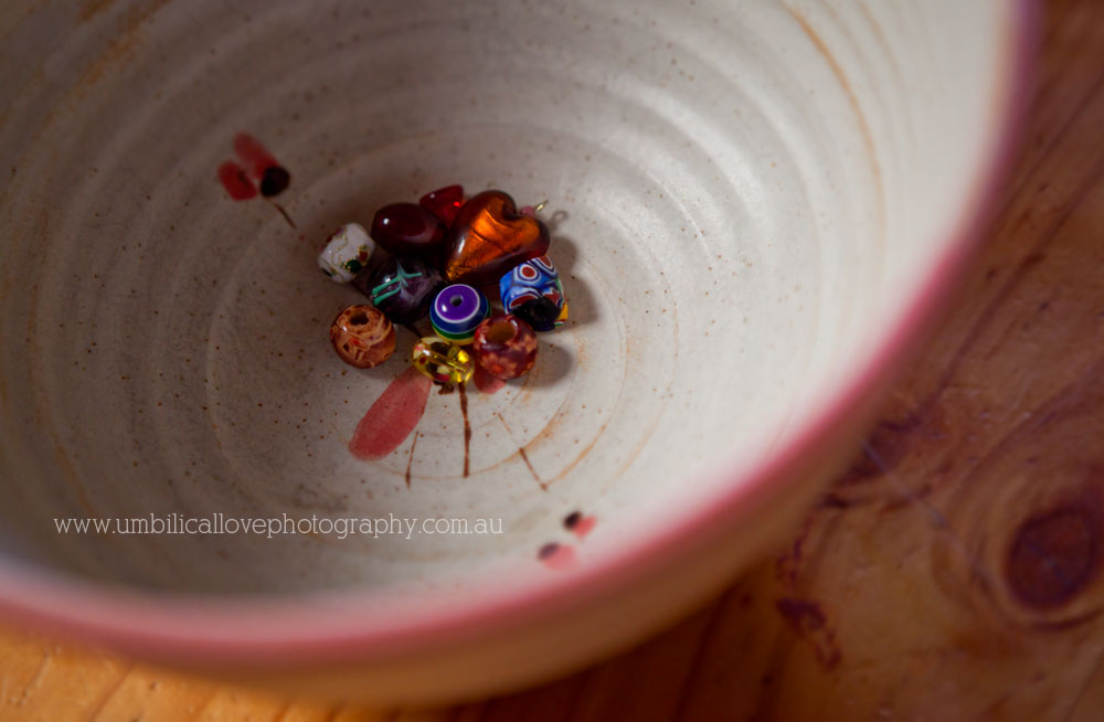 Maleny Baby Shower Photographer Sunshine Coast beads in a bowel to make a blessing way bead neckelace