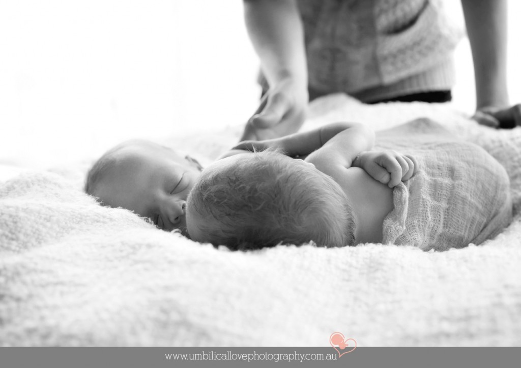 baby photographer calming & positioning baby