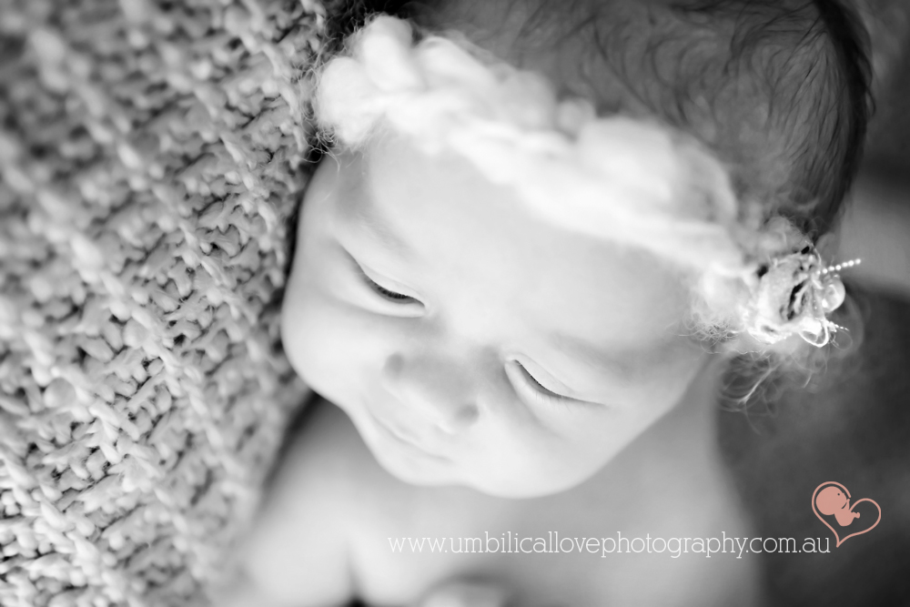 baby photos sunshine coast photography new baby with headband on