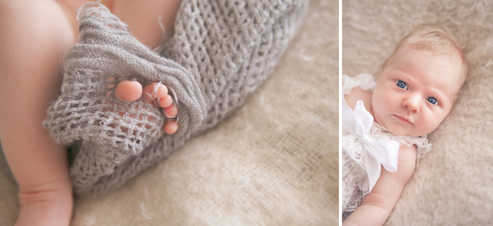 Babies toes through a grey mesh wrap black and white fetal position photo