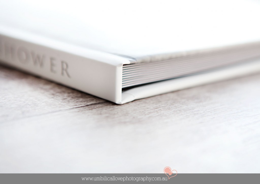 hard covered newborn baby professional photographers client album Sunshine Coast hard covered custom designed coffee table album