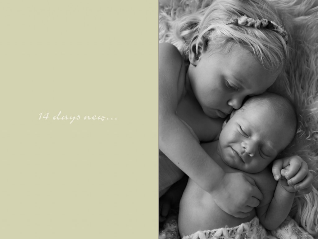 Baby & Family Photographer Albury toddler sister hugging her newborn baby brother