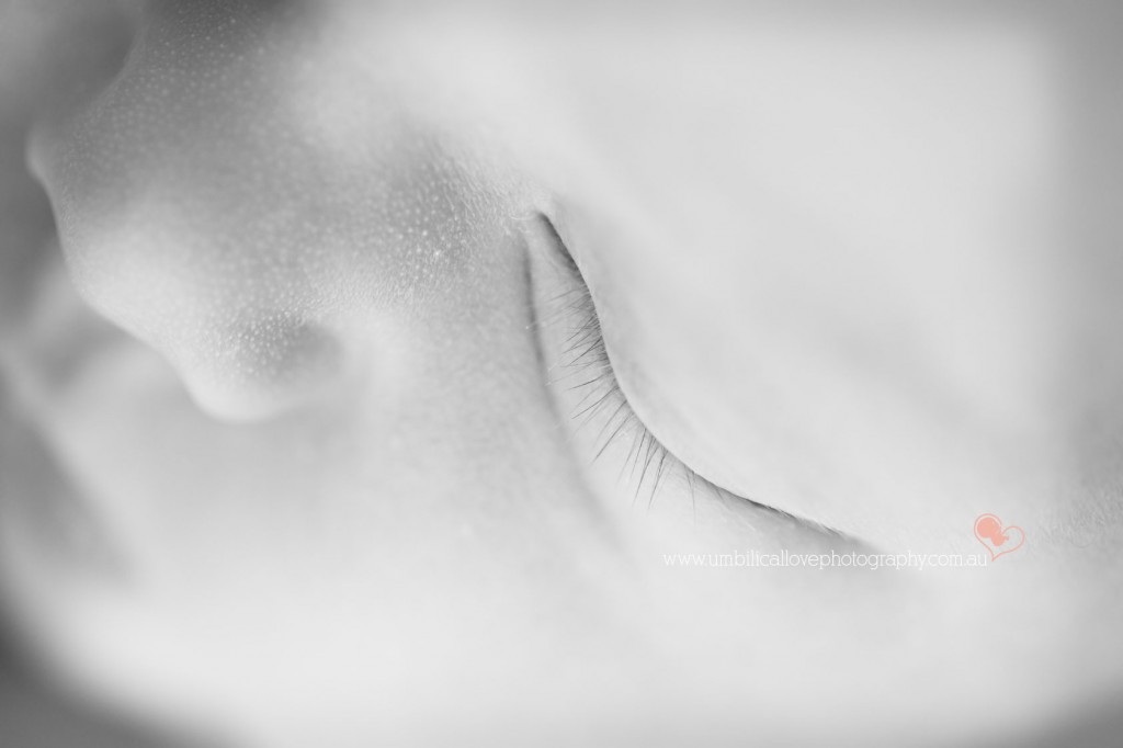 macro shot of long eyelashes of a newborn baby