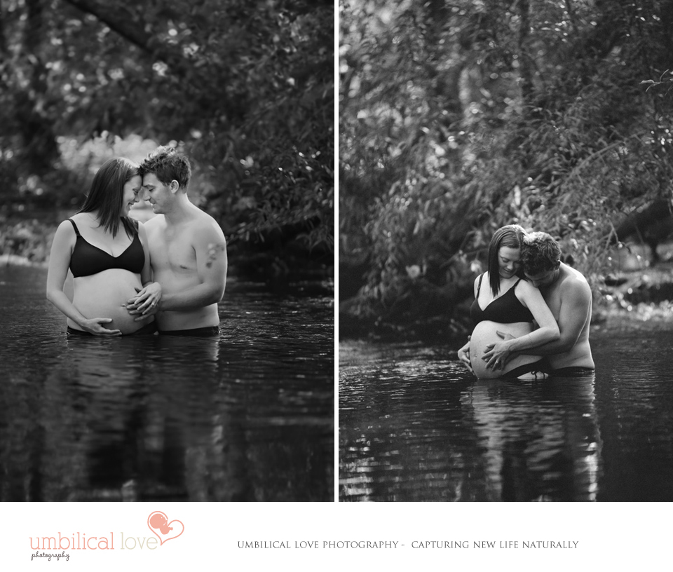 a pregnant lady and her partner holding her belly in a creek bed