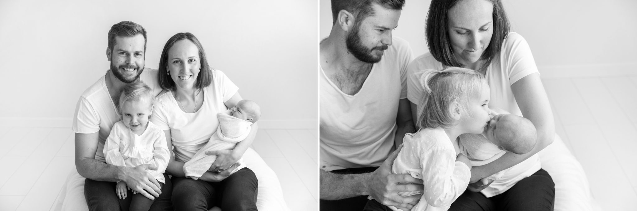 Family sits together with their newborn baby