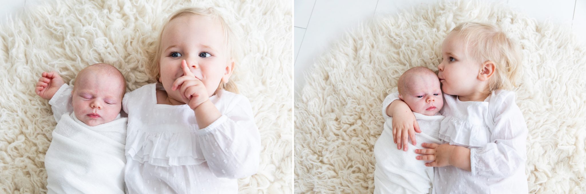 Big sister gives little sister a big kiss on the head