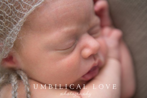 close up of newborns face